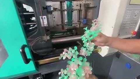 Plastic artificial flower mold test in haijiang injection molding machine