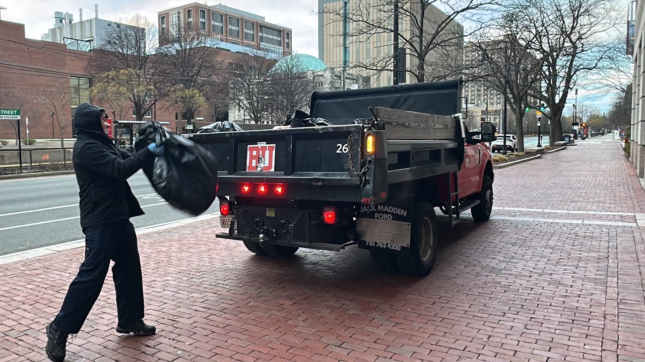 Boston University students emptying public barrels on New Year’s Eve morning