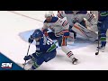 Canucks phillip di giuseppe spinsandscores backhander amid oilers offside confusion