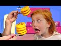 DON’T DROP THE FOOD!! Adley plays Pancake Pile Up toy with Mom and Dad (Hide N Seek)