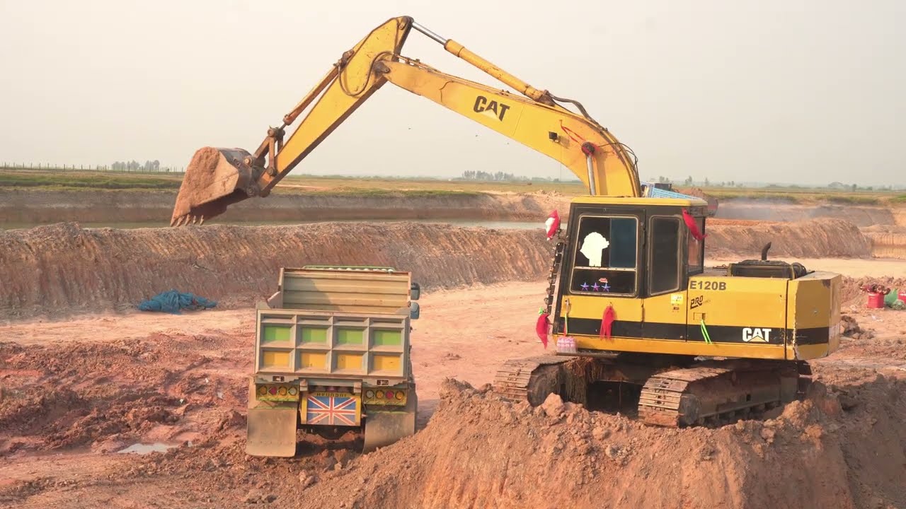 CAT E120B Excavator Working Deep Pond With DIY Car..