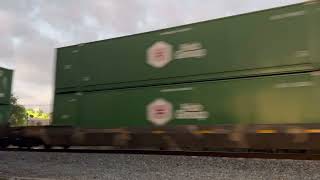 FEC intermodal train 202 and FEC local train 915 passing through port St. John heading northbound