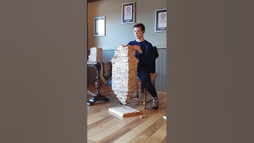 Most Jenga blocks stacked on one vertical Jenga block - 1,840 by Auldin Maxwell 🇨🇦