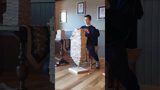 Most Jenga blocks stacked on one vertical Jenga block - 1,840 by Auldin Maxwell 🇨🇦