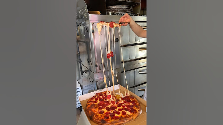 The DOUBLE STACKED PIZZA from East Village Pizza in NYC never ceases to amaze us. 🍕🍝 #DEVOURPOWER