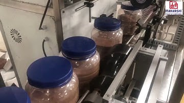 SHRINK SLEEVE APPLICATOR FOR BIG JARS