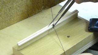 Fastening a line to a belaying pin on a real ship and model