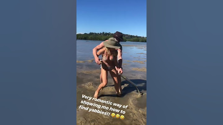 Chris Hemsworth and Elsa Pataky riding each others while finding yabbies