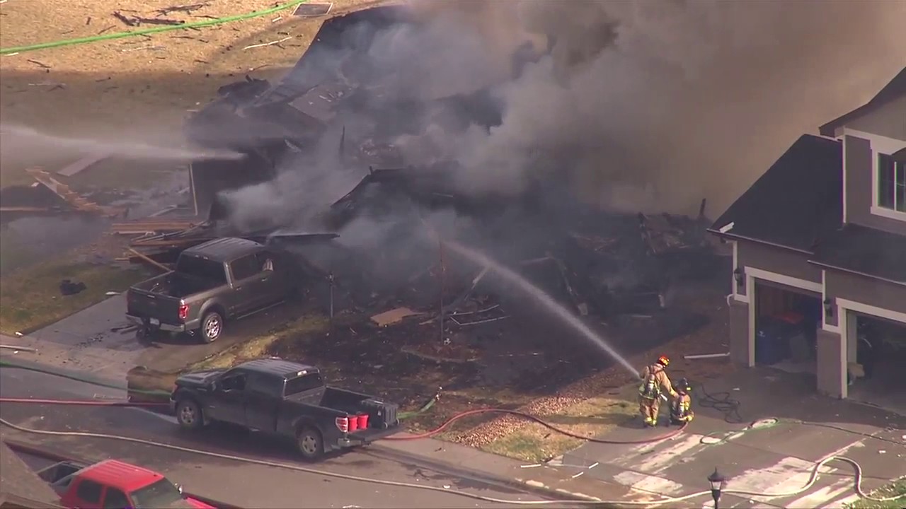 Home leveled, firefighters work to extinguish flames - YouTube