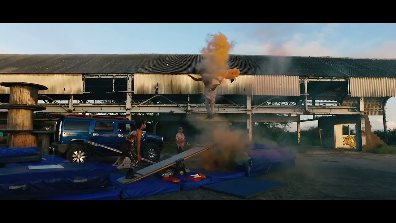 Acrobatic Group in Action Film Costumes Performs Cool Tricks on Teeterboard - 1189240