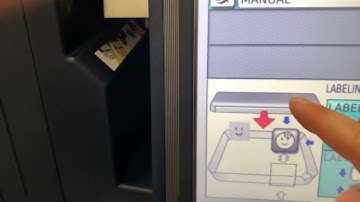 How to program label position by going to tray programming