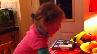 Poppy playing catch with the cd player!