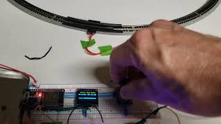 Upgraded model train PSU with bidirectional speed control.