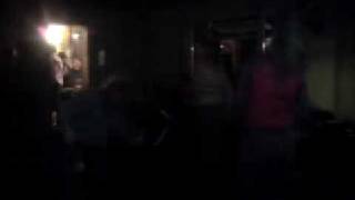 drunk man head banging to status quo