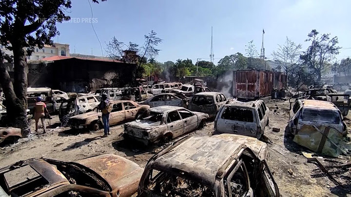 Haiti gang members set fire to garage in Port-au-Prince