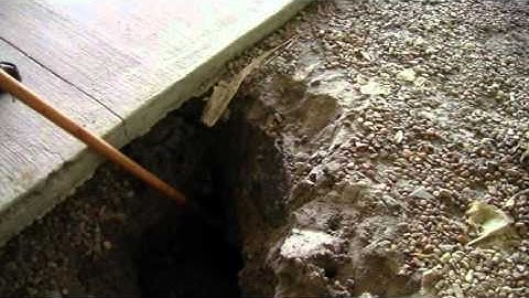 Sinkhole in garage deeper than a hoe handle