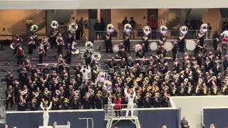 The Arkansas State Marching Band perform stand tunes during the Xbowl Bowl