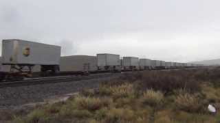 WBD Union Pacific Railroad #8736 UPS Van Train at track speed West of Evanston WY, 9/13/13 ..033