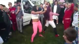 Traveller girls dancing at fair