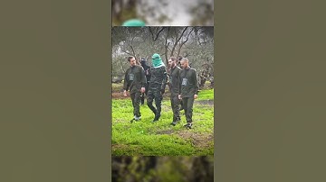 Israeli Hostage KISSES Al Qassam Fighter On Stage