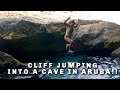 CLIFF JUMPING INTO A CAVE IN ARUBA!!