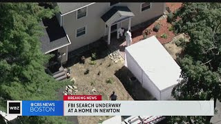 FBI agents search Newton home