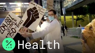 Cleveland Health Workers Hold Pro-Biden Rally Ahead of Presidential Debate