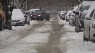 City residents dig out side streets following winter storm