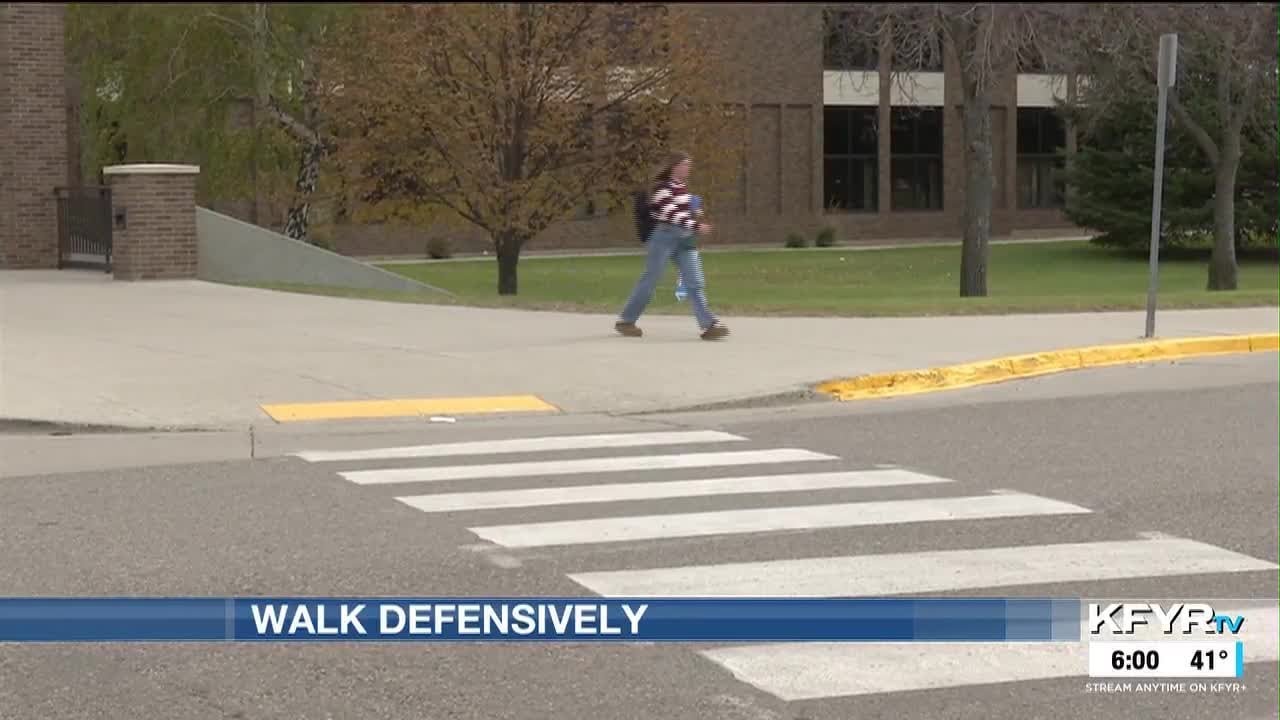 Law enforcement gives tips on crosswalk safety after vehicle-pedestrian crashes at Bismarck high...