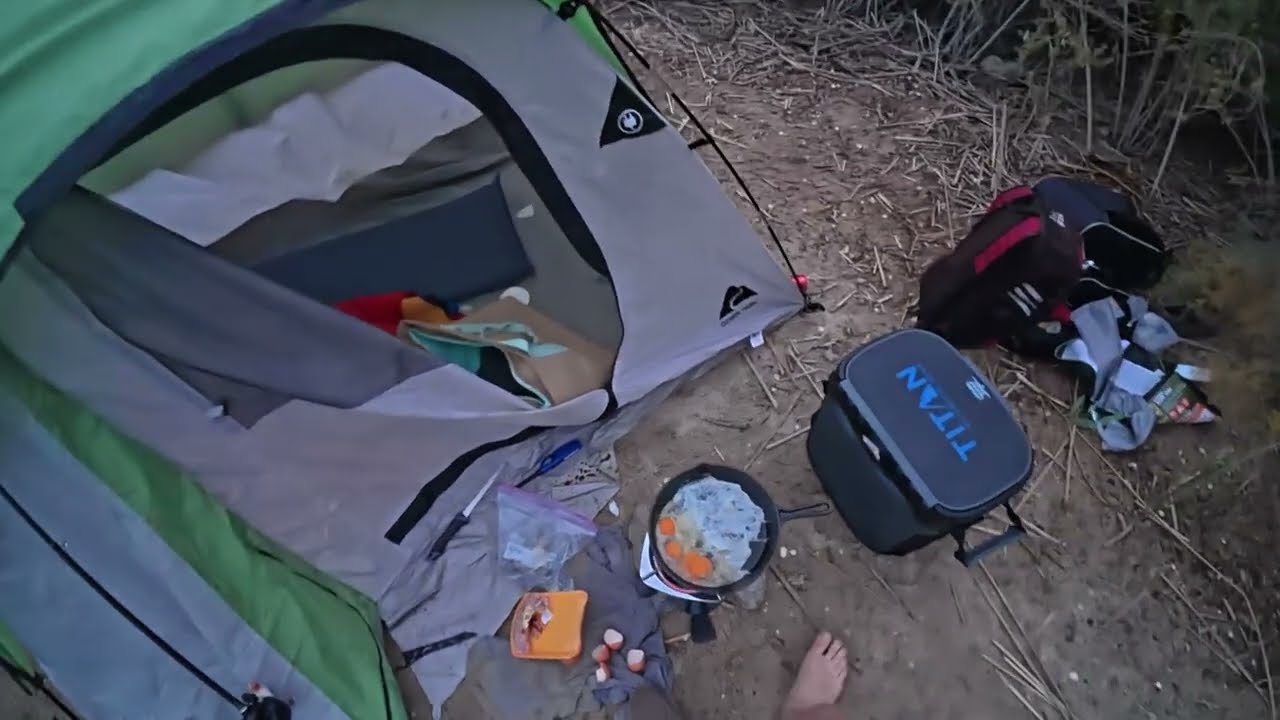 Overnight camping and fishing on a desert lake