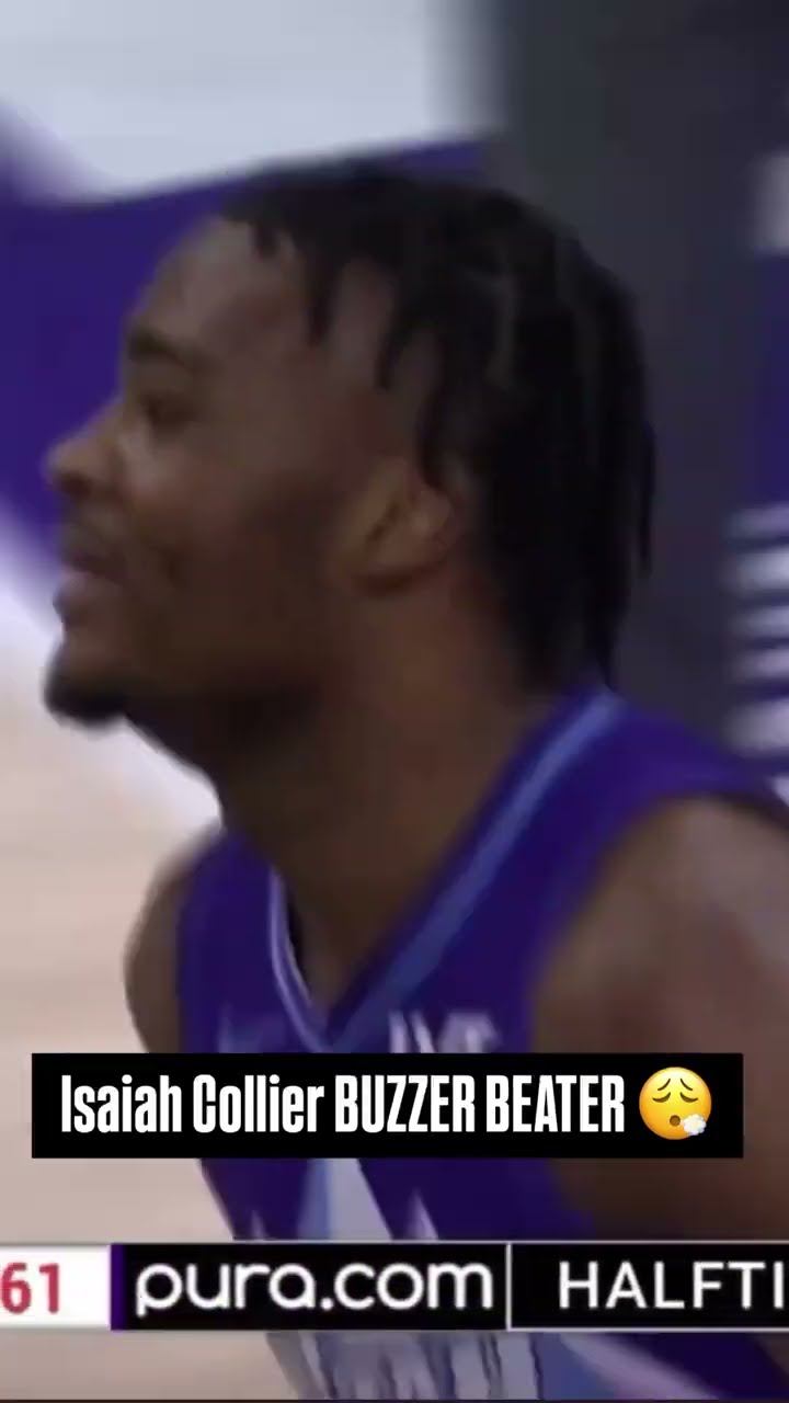Isaiah Collier sinks the half-court shot before half ?