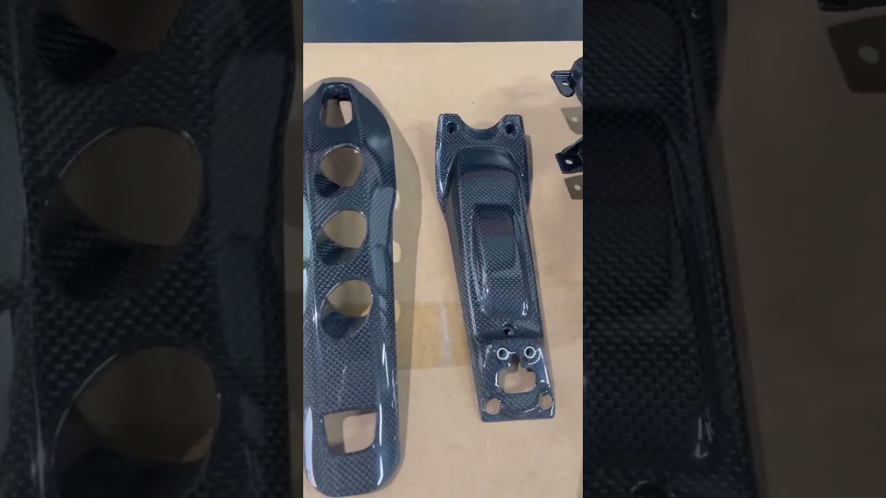 Ferrari F12 carbon fiber interior, center console panel, cup holder 