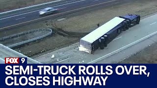 Semi-truck rolls over near Owatonna, temporarily closing highway