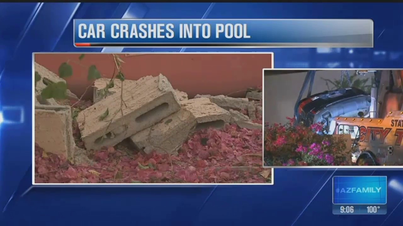 Man rescued from SUV after crashing into a pool - YouTube