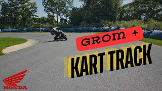 Two Honda Groms on a Kart Track