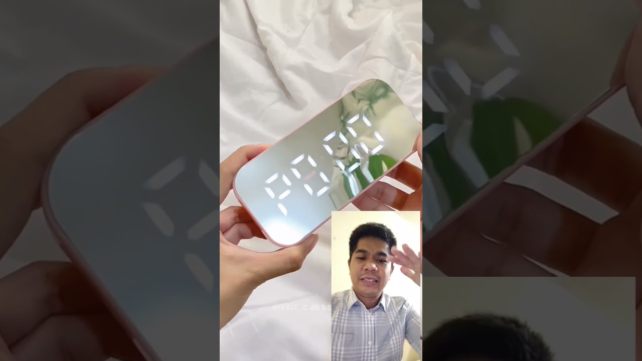 Mirror Bluetooth speaker clock