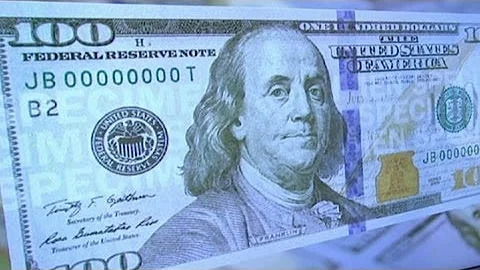 Do all 100 dollar bills have blue lines? (2024)