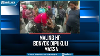 Maling HP Bersenjata Cakram Bonyok Dipukuli Massa