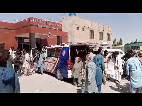 At least 57 people killed after pair of suicide bombs detonated in Pakistan