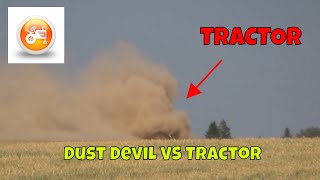 Tractor and disc harrow creating dust devils in field