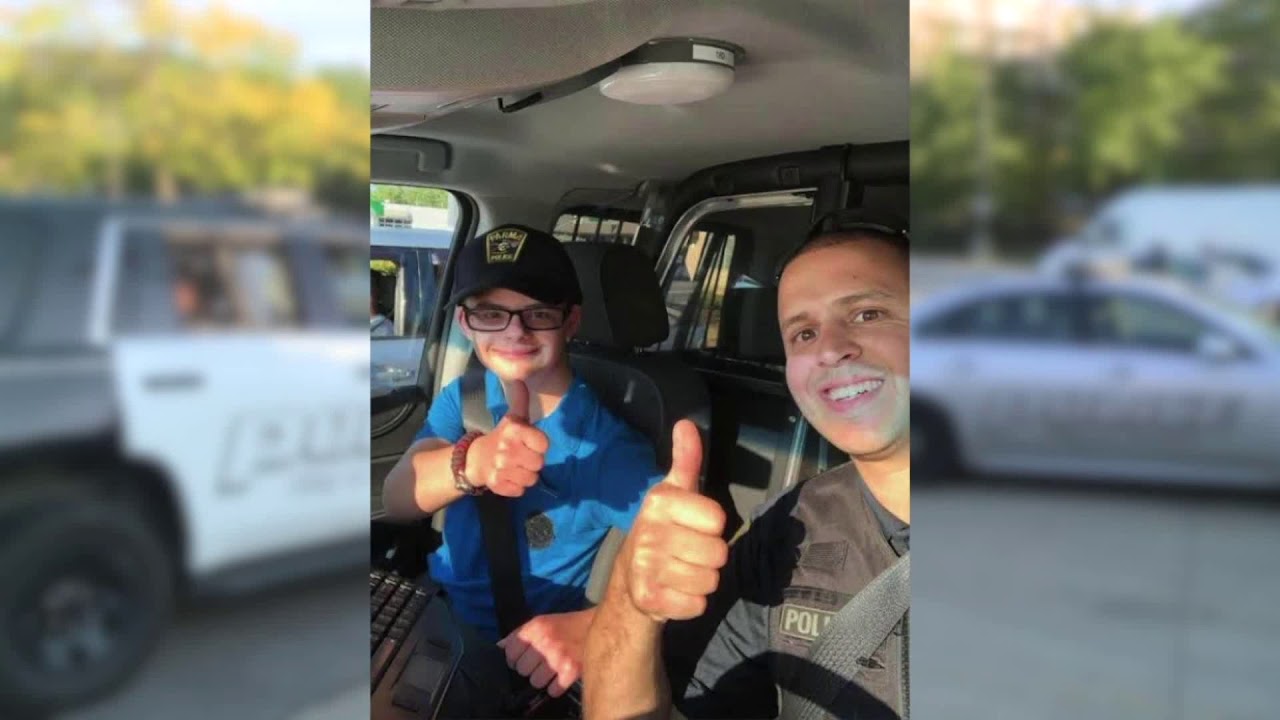 Officer ride along with boy with Down syndrome
