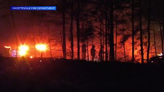 Fayetteville crews battle brush fire; traffic, rail lines affected