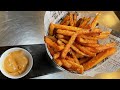 Its cooking time burger sweet potato fries 50cm sausage at morgans al bandar rotana dubai