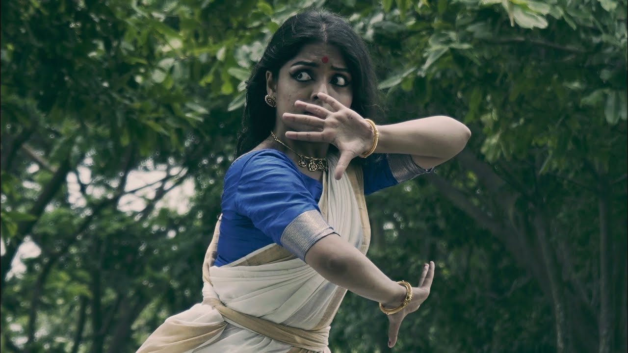 In torrents Rabindra Sangeet  Hridoye Mondrilo Cinematic MonsoonRain DanceRabindranath Tagore