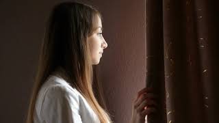 Girl looking ai the window