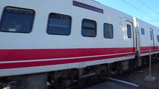 127次普悠瑪與2234次區間車通過斗南鎮部前寮平交道
