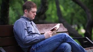 Man Reading A Newspaper Stock Video