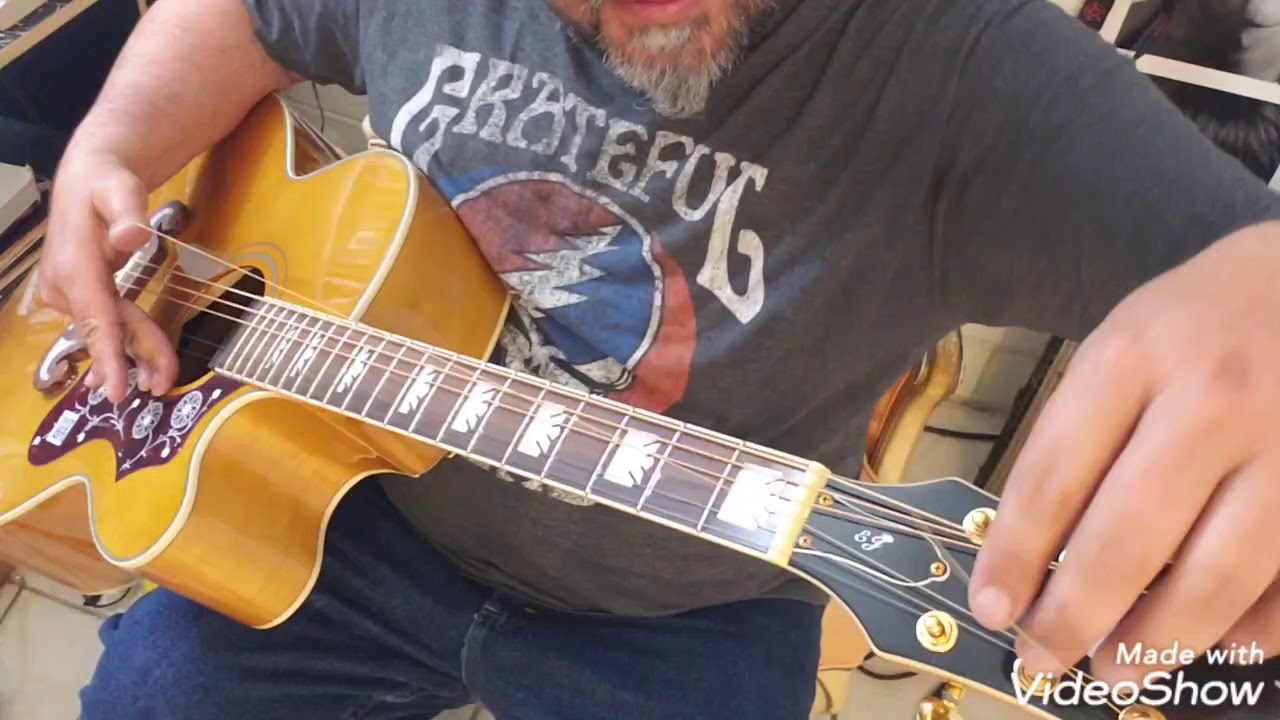 How to change a broken acoustic guitar string. YouTube