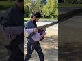 طفلة مشلولة يساعدها رجل فقير