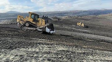 Two Caterpillar D9T Bulldozers Working On Huge Mining Area - 4k